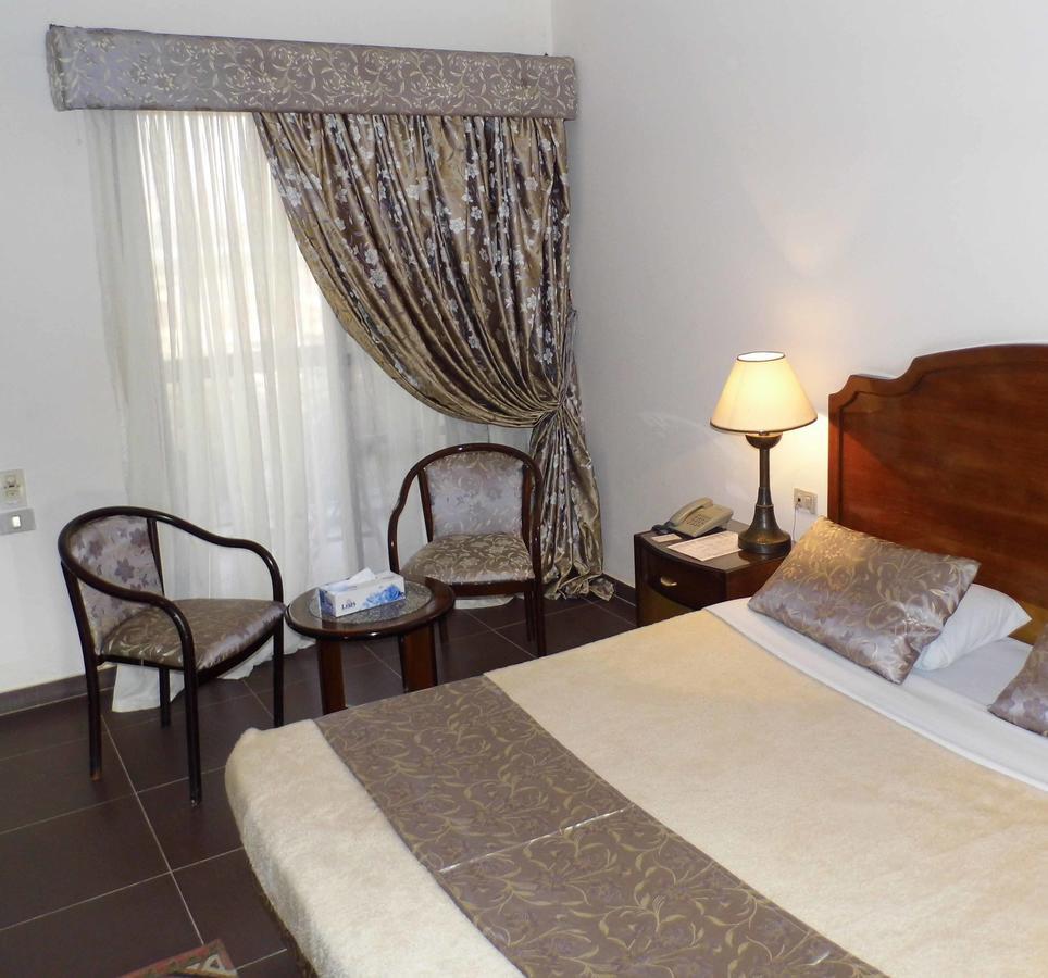 Mg Nefertiti Hotel Al-Minja Pokój zdjęcie